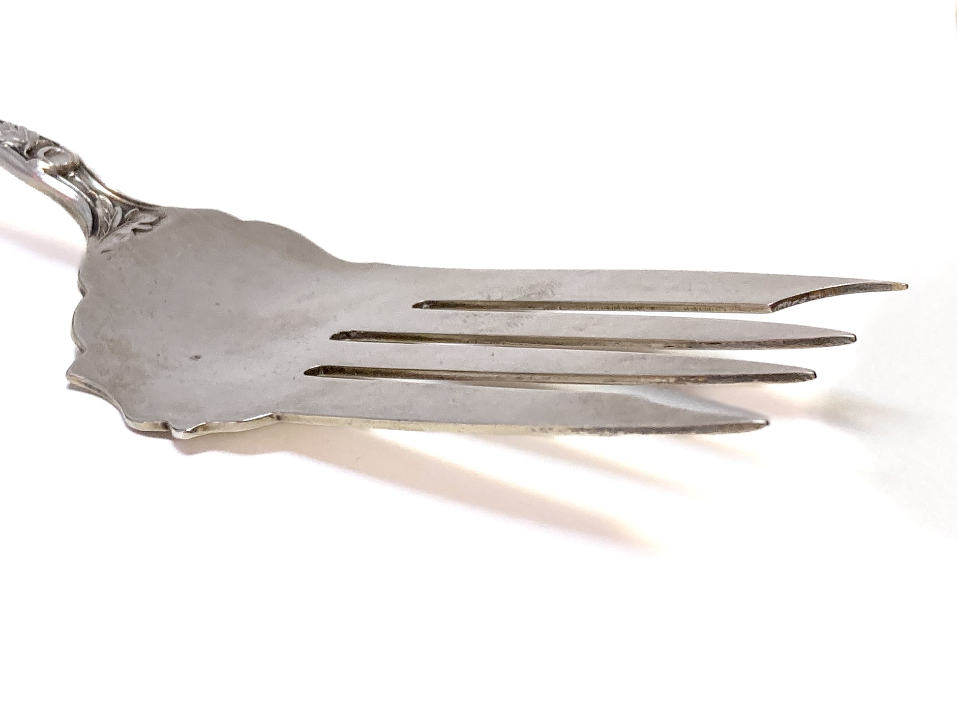 Antique Poppy Flower Pattern Baker Manchester Co Sterling Silver Cold Meat Serving Fork white background