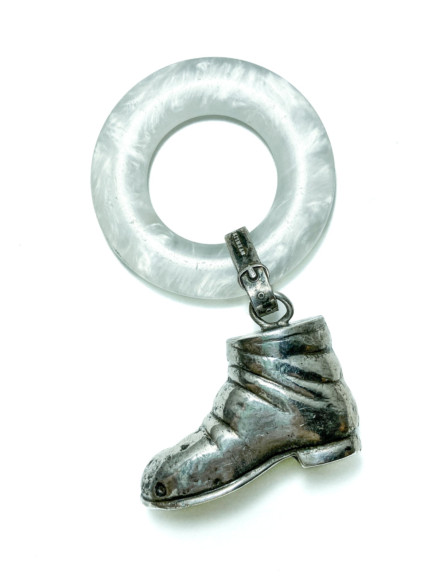 Antique Victorian Sterling Silver Baby Shoe Mother of Pearl Rattle on white background