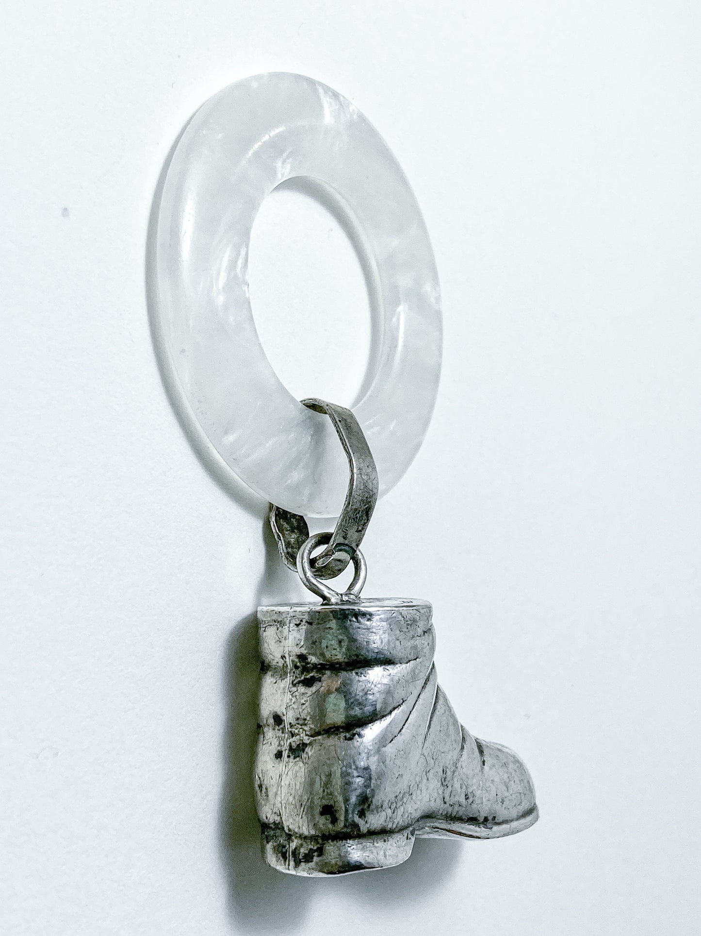 Antique Victorian Sterling Silver Baby Shoe Mother of Pearl Rattle on white background