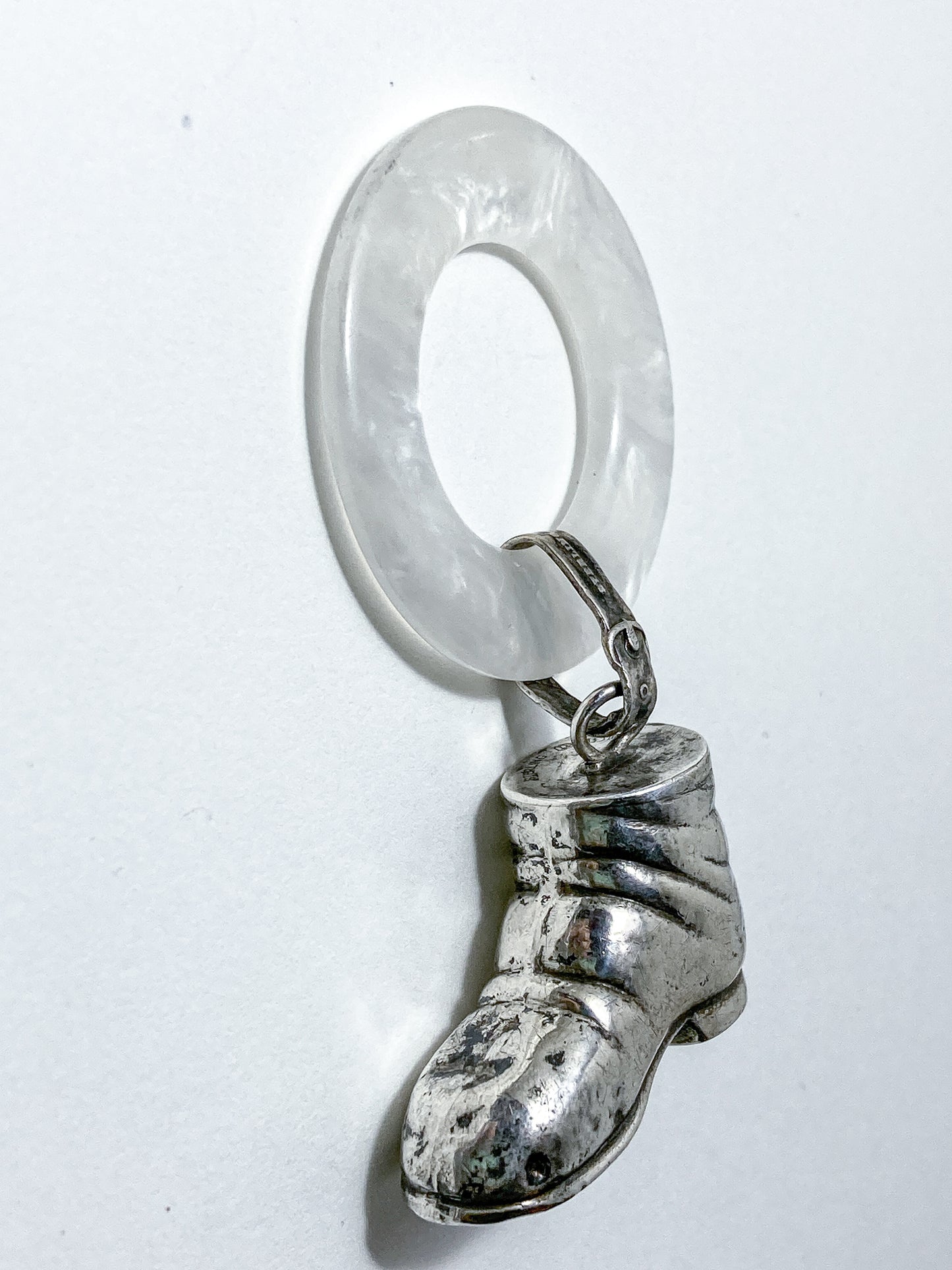 Antique Victorian Sterling Silver Baby Shoe Mother of Pearl Rattle on white background