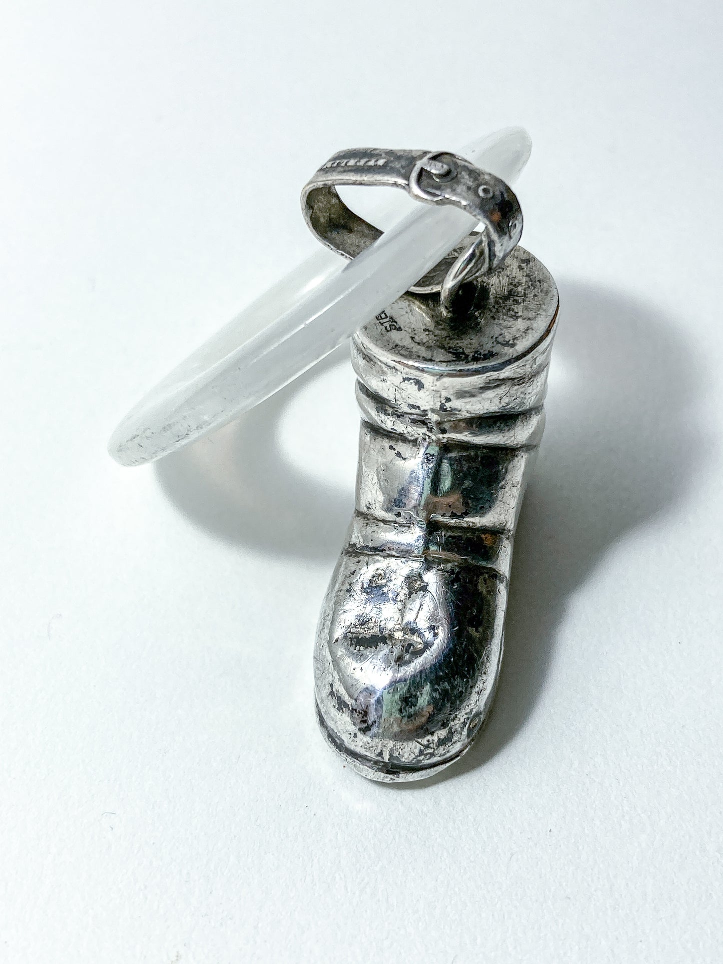 Antique Victorian Sterling Silver Baby Shoe Mother of Pearl Rattle on white background