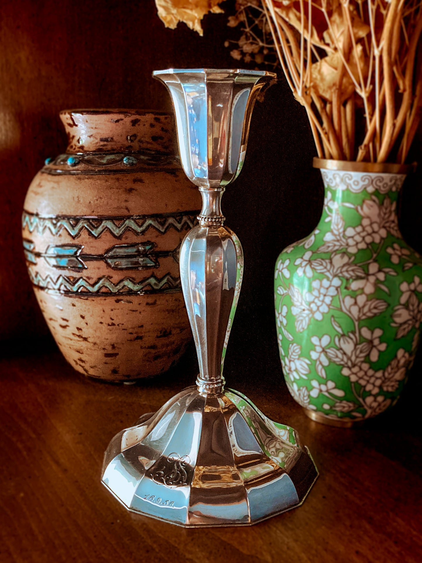 Silver candle holder with two decorative vases in the background; Elegant Vintage 1956 Finnish Sterling Silver Monogramed Candlestick