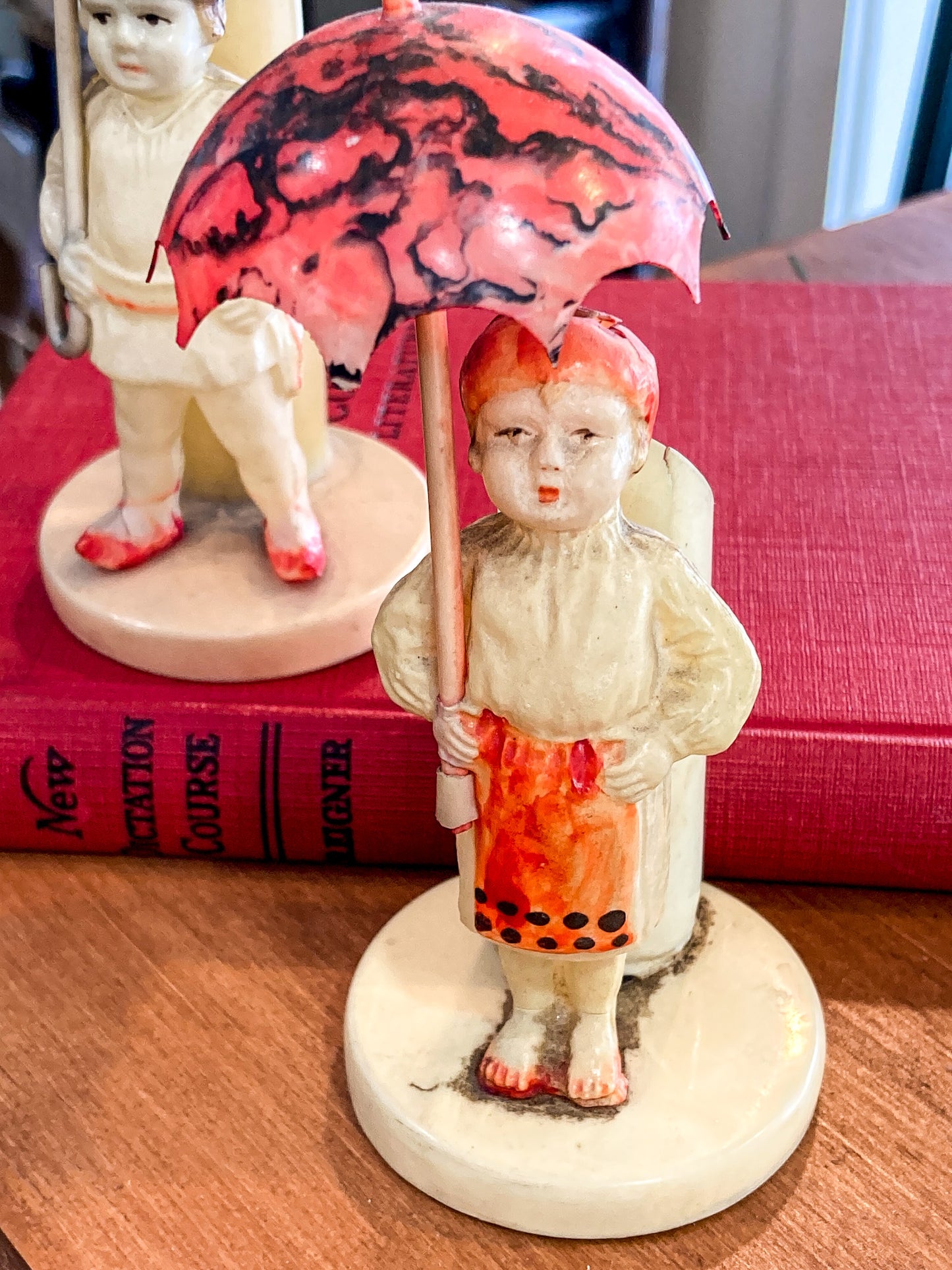 Pair Antique Celluloid Folk Figural Couple with Umbrellas Toothpick Holders