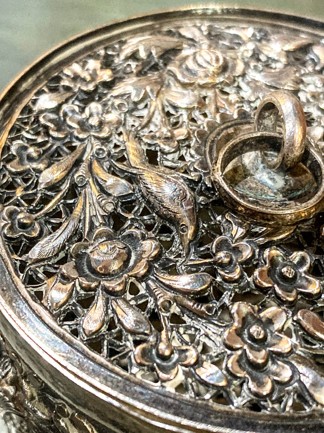 20th Century Round India Floral Bird Repoussé Openwork Silver Trinket Box