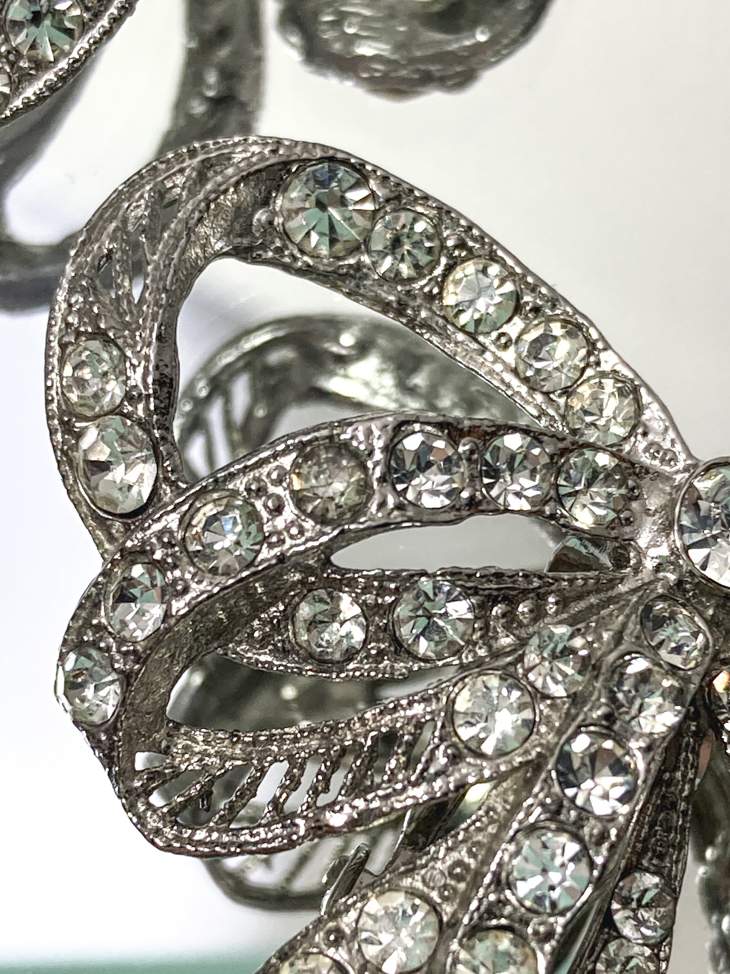 Vintage Rhodium Plated Rhinestone Double Loop Bow Statement Clip On Earrings