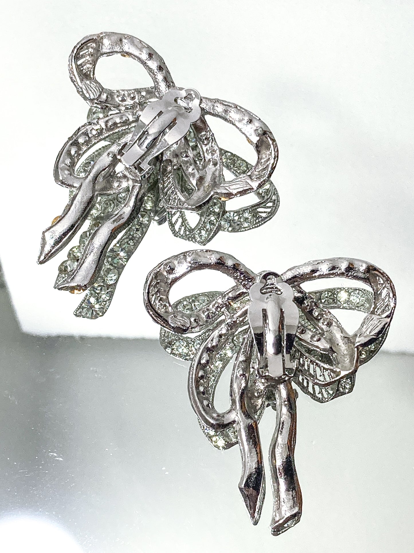 Vintage Rhodium Plated Rhinestone Double Loop Bow Statement Clip On Earrings back