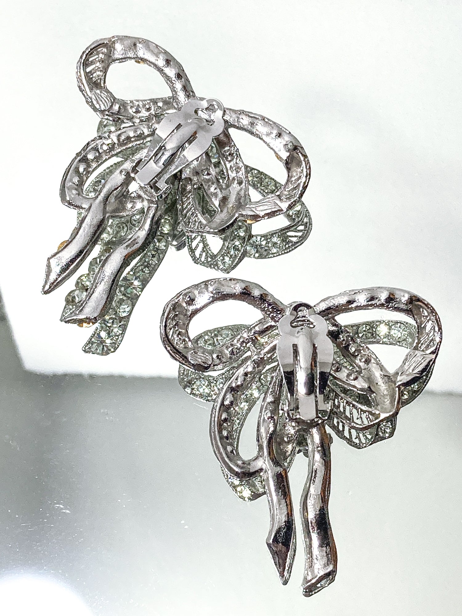 Vintage Rhodium Plated Rhinestone Double Loop Bow Statement Clip On Earrings back