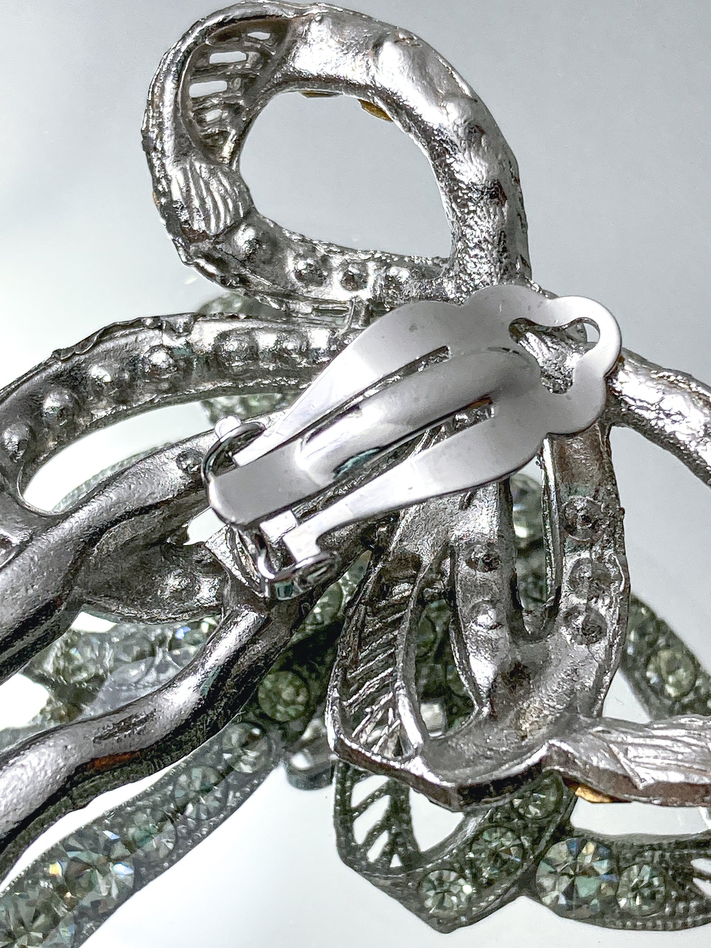 Vintage Rhodium Plated Rhinestone Double Loop Bow Statement Clip On Earrings back