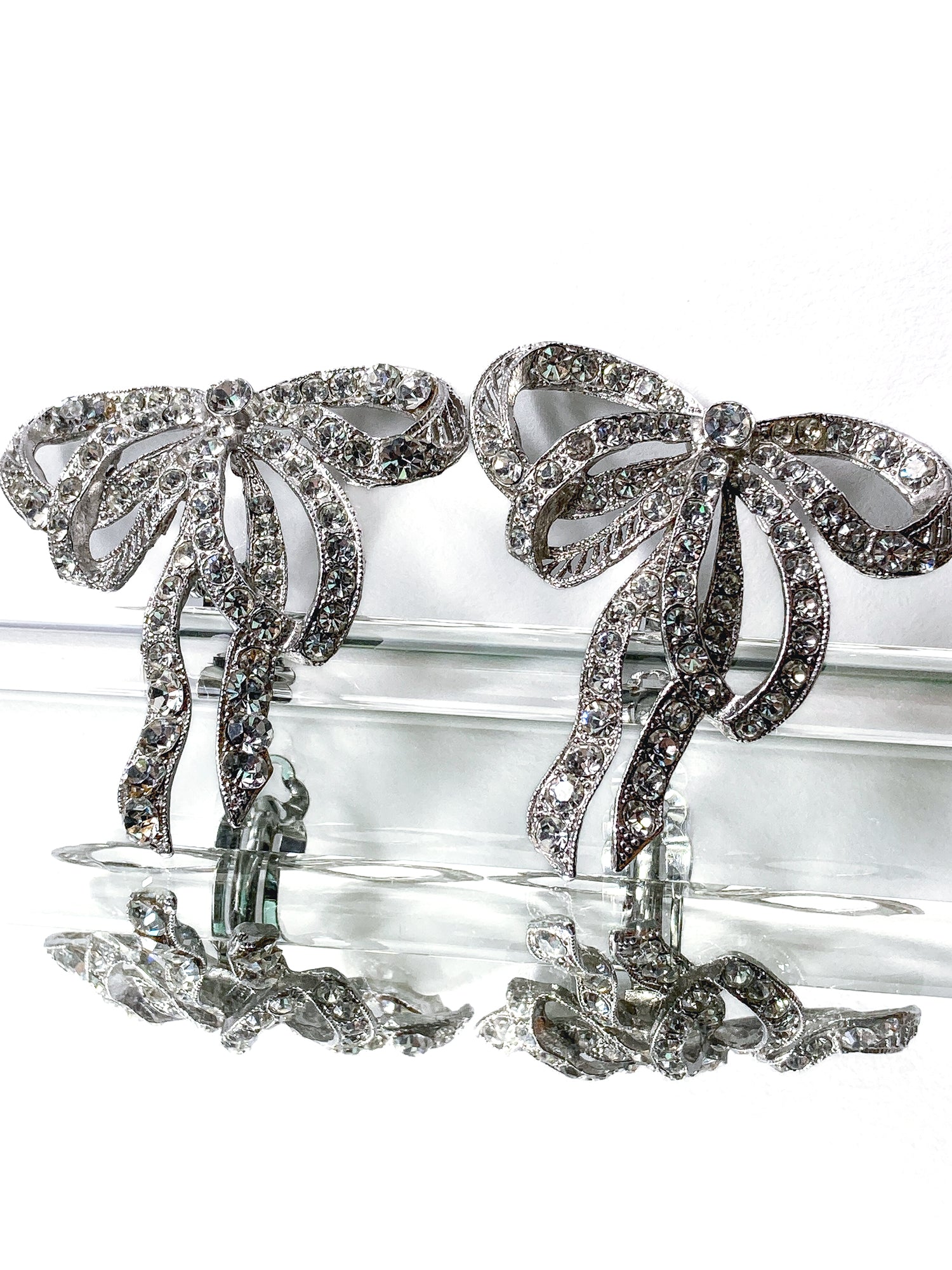 Vintage Rhodium Plated Rhinestone Double Loop Bow Statement Clip On Earrings