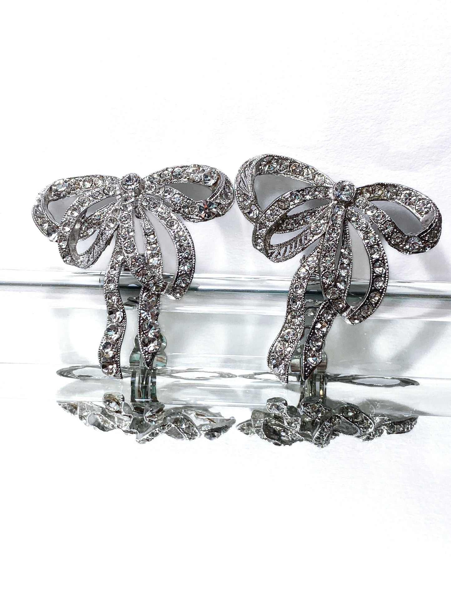 Vintage Rhodium Plated Rhinestone Double Loop Bow Statement Clip On Earrings
