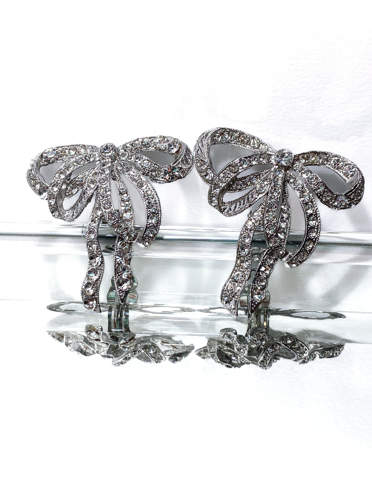 Vintage Rhodium Plated Rhinestone Double Loop Bow Statement Clip On Earrings