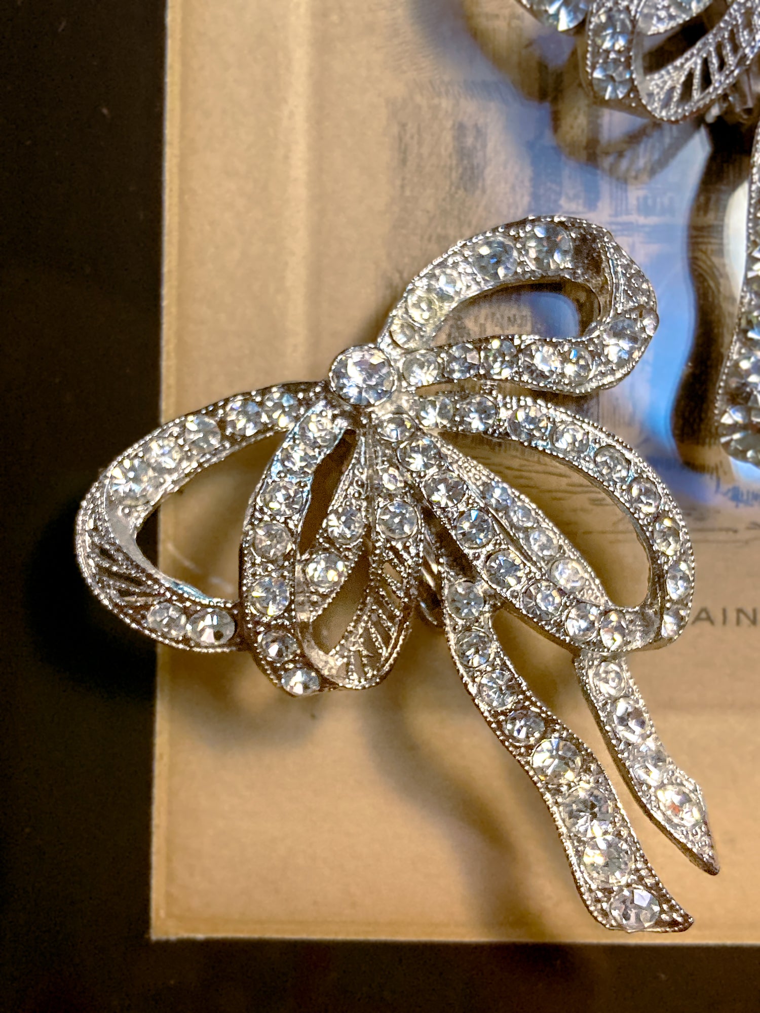 Vintage Rhodium Plated Rhinestone Double Loop Bow Statement Clip On Earrings