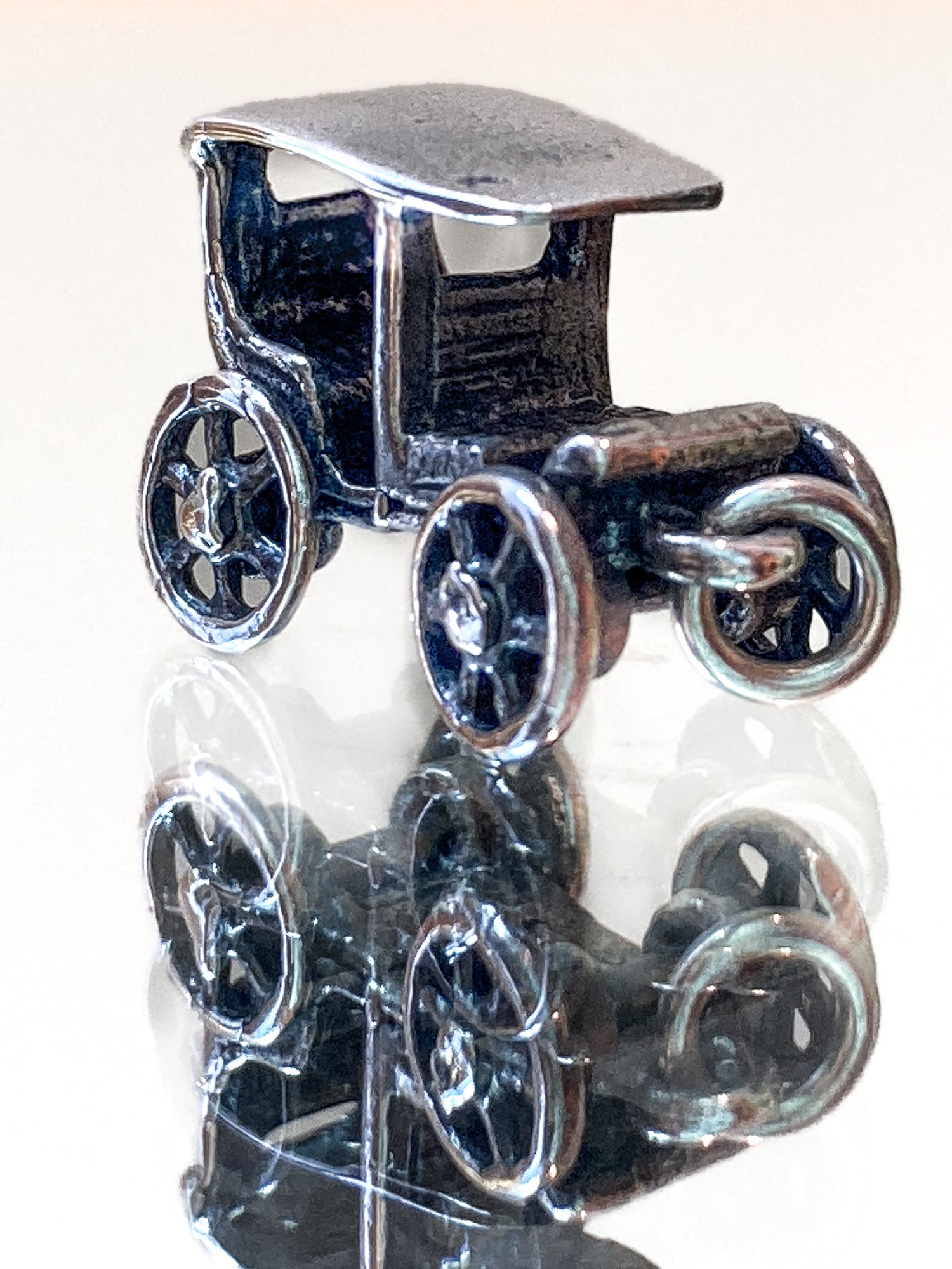 Vintage Sterling Silver Miniature Antique Automobile Car Charm Jewelry white mirrored background