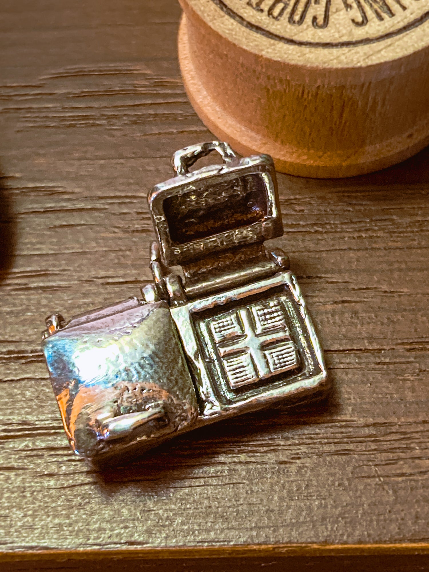Vintage Sterling Silver Miniature Double Waffle Iron Griddle Charm Jewelry wood background
