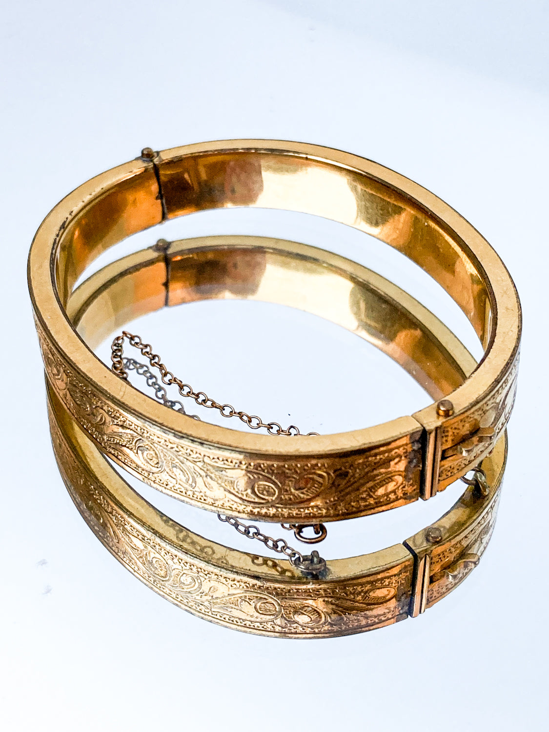 Antique Victorian Gold Filled Engraved Hinged Bangle Bracelet on mirror