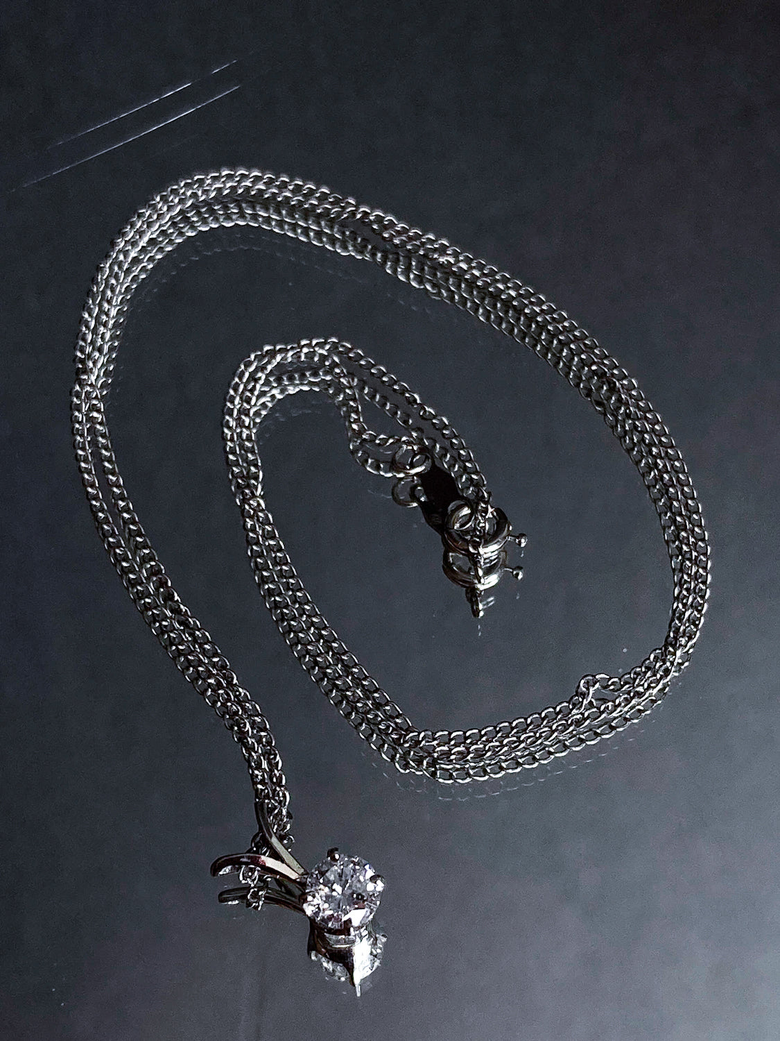 14K White Gold Solitaire Brilliant Diamond Drop Pendant Necklace Full Chain on Mirror Wrapped in Swirl