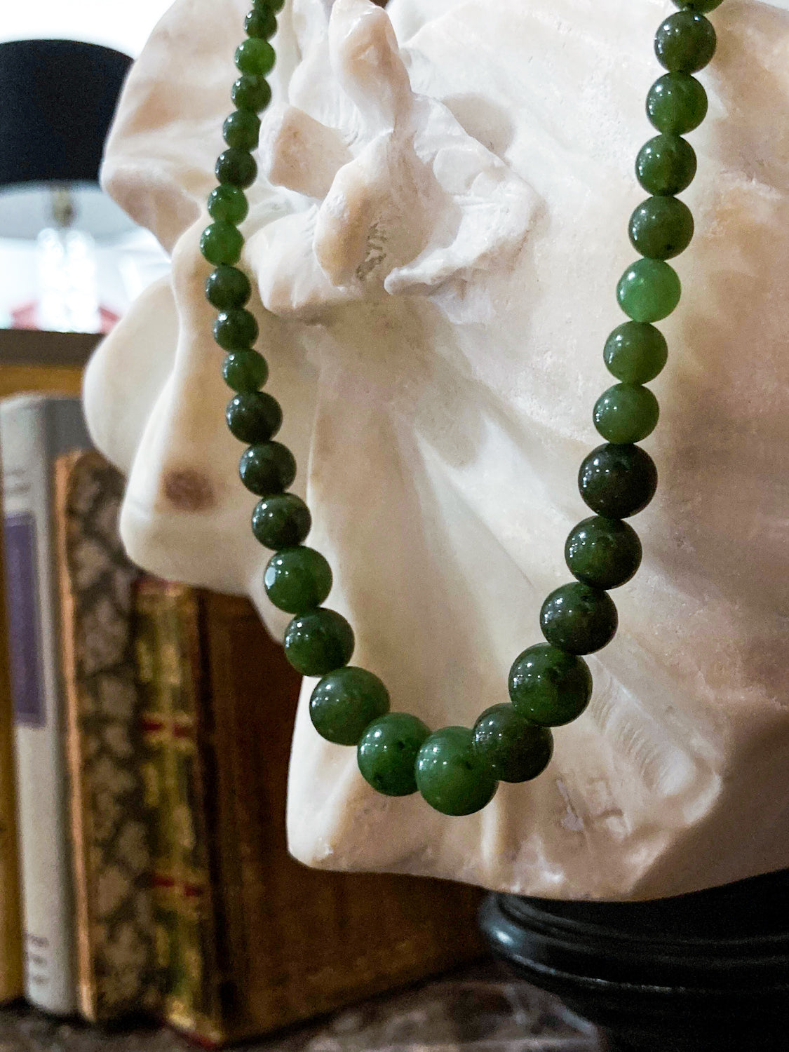 Vintage Graduated Green Nephrite Stone Bead Elongated Necklace Close up of beads