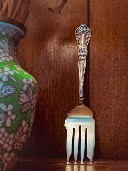 Antique Poppy Flower Pattern Baker Manchester Co Sterling Silver Cold Meat Serving Fork wood background