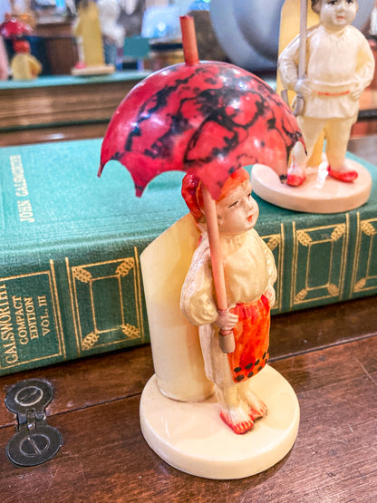 Pair Antique Celluloid Folk Figural Couple with Umbrellas Toothpick Holders