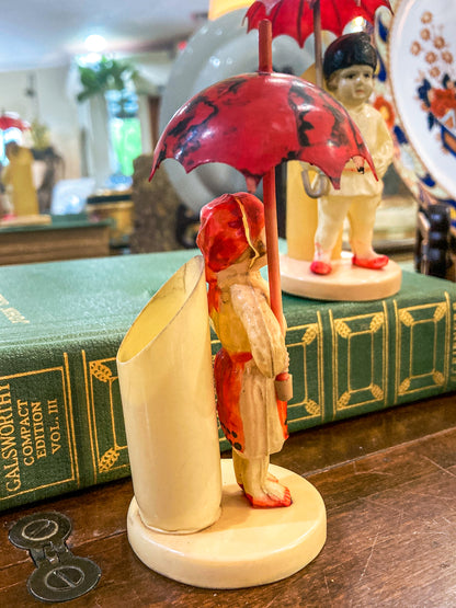 Pair Antique Celluloid Folk Figural Couple with Umbrellas Toothpick Holders