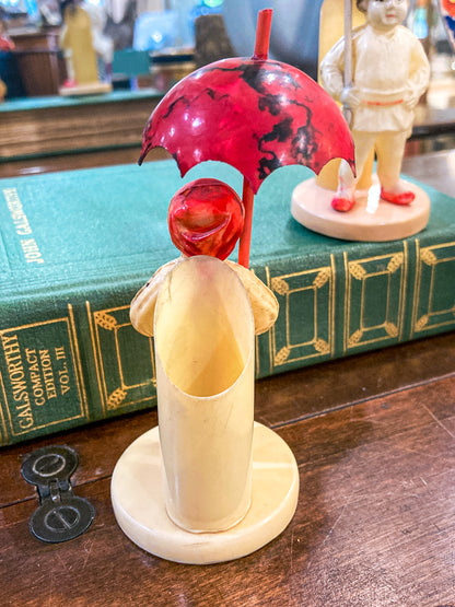 Pair Antique Celluloid Folk Figural Couple with Umbrellas Toothpick Holders