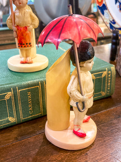 Pair Antique Celluloid Folk Figural Couple with Umbrellas Toothpick Holders