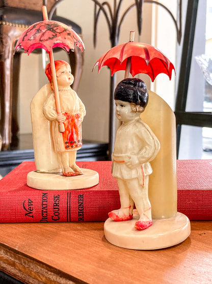 Pair Antique Celluloid Folk Figural Couple with Umbrellas Toothpick Holders