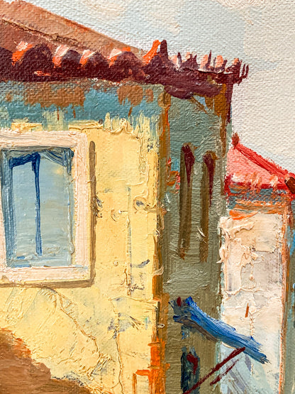 An impressionistic oil painting of a Venetian-style building facade, featuring textured brushstrokes in pale yellow, blue, terracotta red, and white. Vintage 1960s Greece Village Seaside Boat Dock Landscape Signed Framed Oil Painting