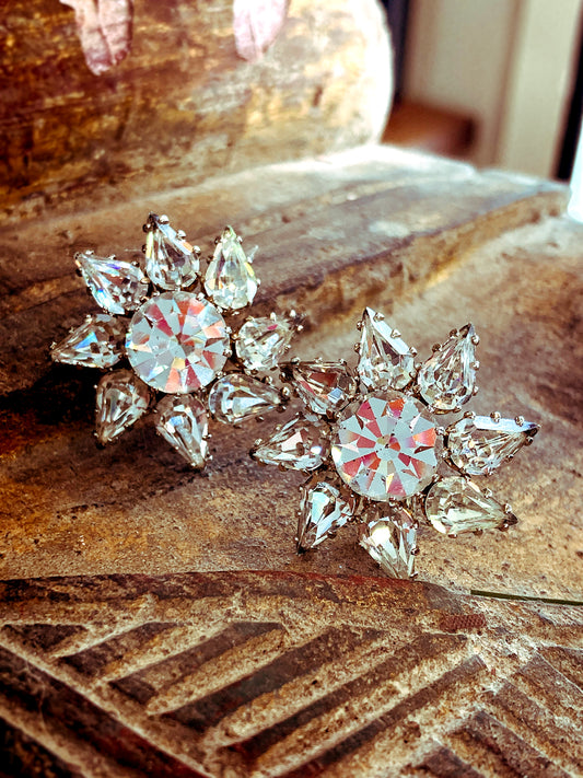 Vintage Austria Clear Rhinestone Starburst Sun Pinwheel Clip Earrings