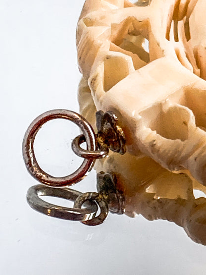 Vintage Carved Celluloid Trunk Holding Elephants Round Pendant