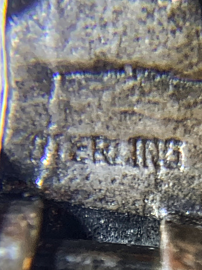 Vintage Sterling Silver Miniature Antique Automobile Car Charm Jewelry white mirrored background hallmark close up