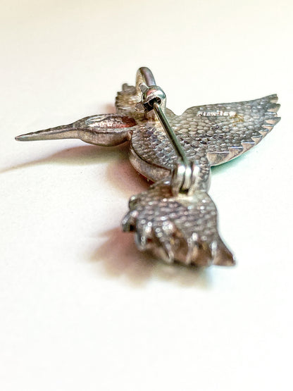 Silver hummingbird brooch on a white background Vintage Sterling Silver Turquoise Gemstone Mosaic Inlay Hummingbird Brooch