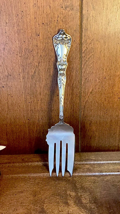 Antique Poppy Flower Pattern Baker Manchester Co Sterling Silver Cold Meat Serving Fork against wood background video